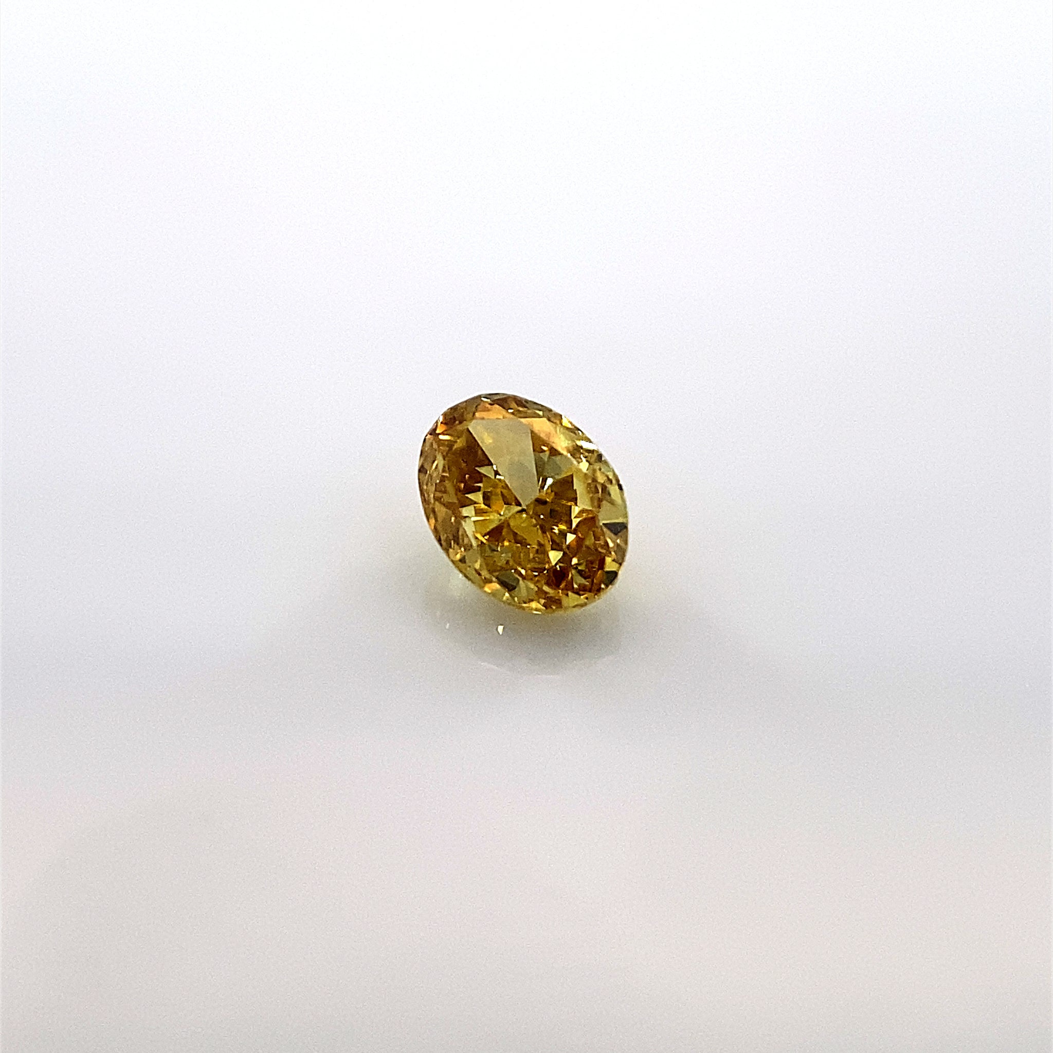 Żółty diament Fancy Deep Orangy Yellow 0,23 Ct / VS2