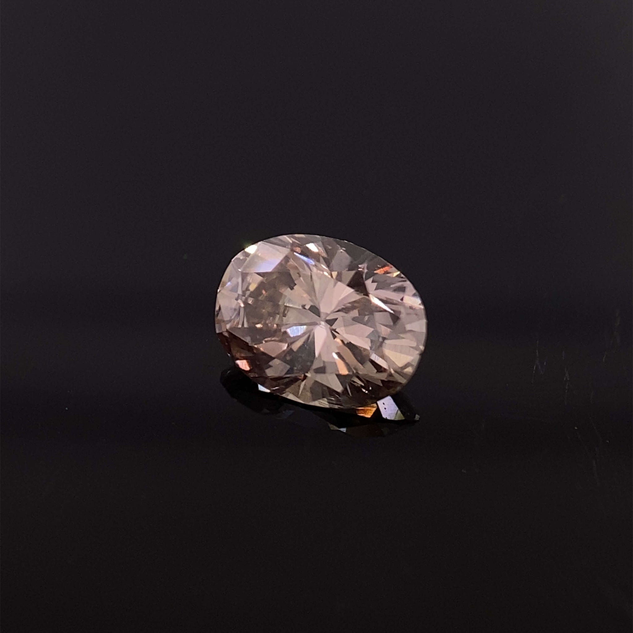 Brązowy diament Fancy Pinkish Brown 0,58 Ct / SI1